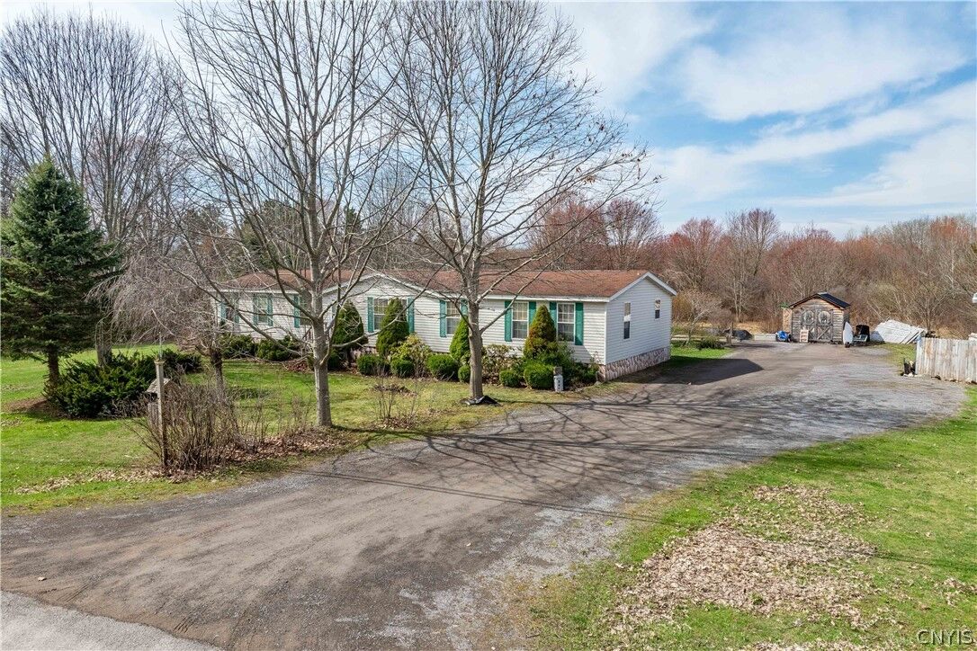 Property Photo:  348 State Route 104B  NY 13114 