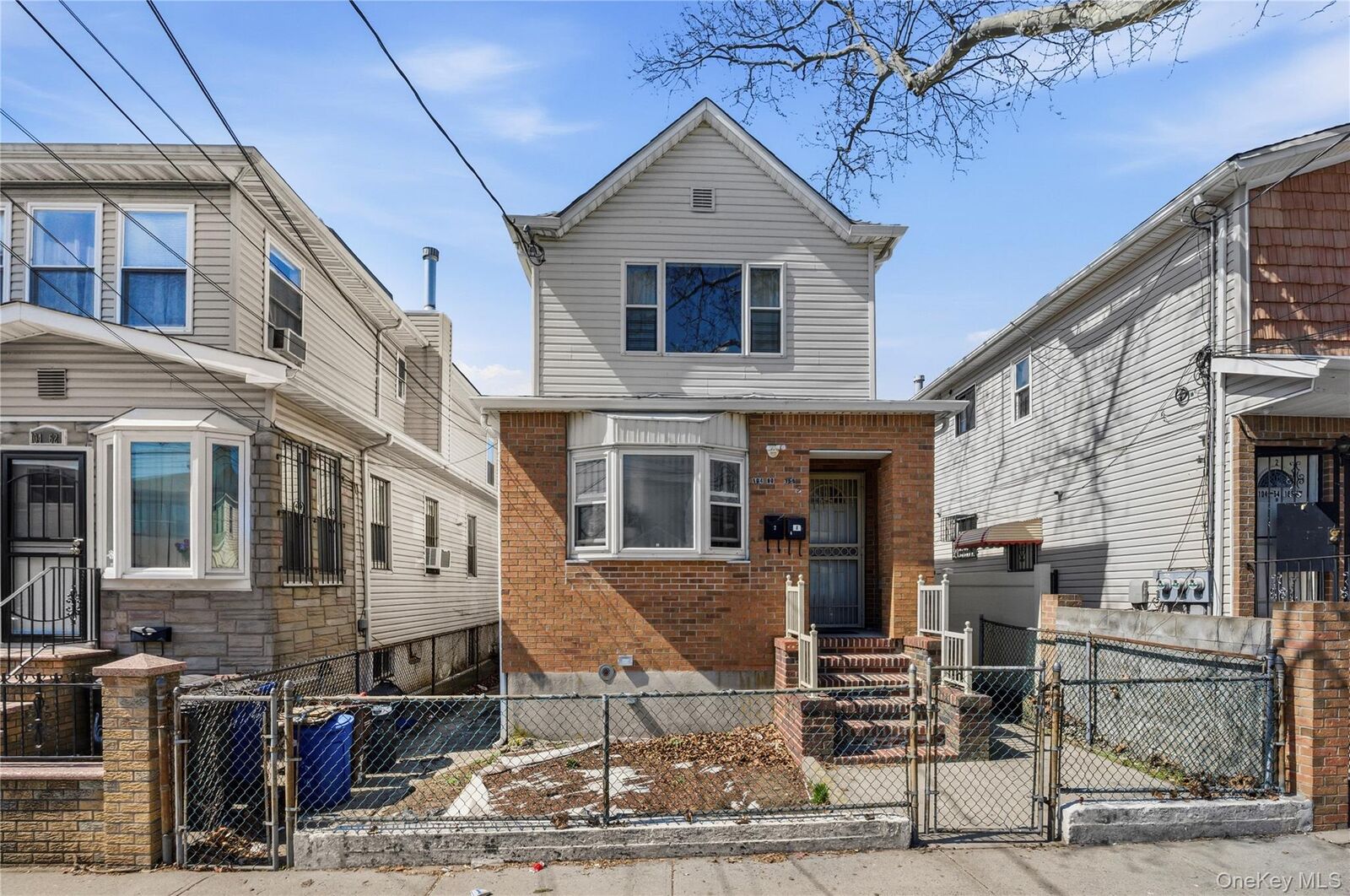 Property Photo:  104-60 165th Street  NY 11433 