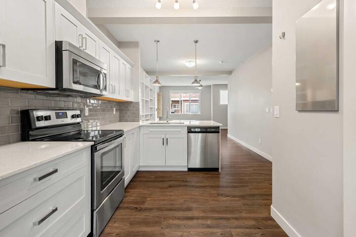 Property Photo:  355 Nolancrest Heights NW 203  AB T3R 0Z9 