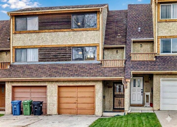 Property Photo:  6909 Ranchero Road NW  AB T3G 1J6 