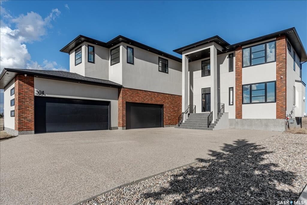 Property Photo:  304 Spruce Creek Crescent  SK S0G 3Z0 