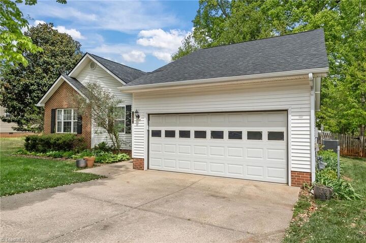 Property Photo:  3987 Cherry Tree Drive  NC 27405 