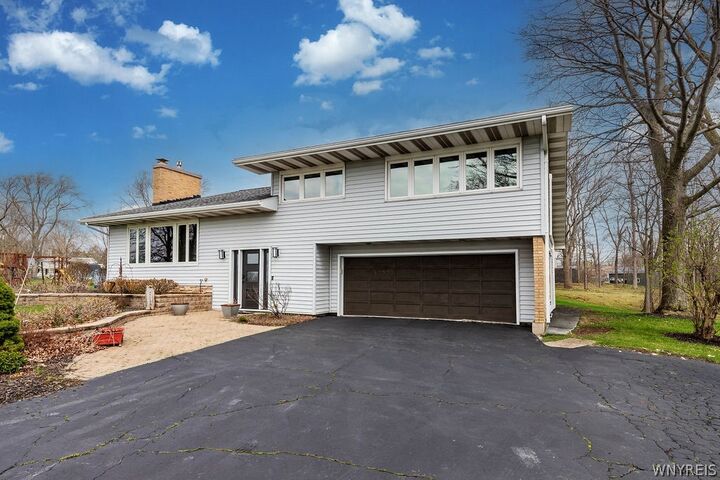 Property Photo:  1255 West River Road  NY 14072 