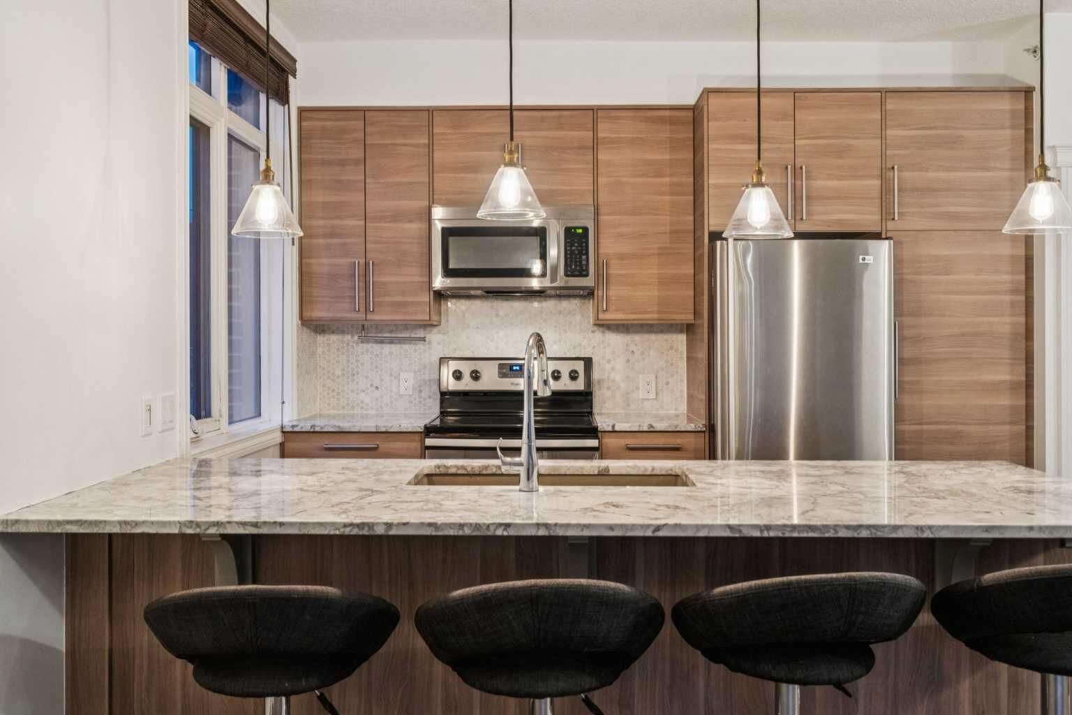 Property Photo:  990 Centre Avenue NE 232  AB T2E 2M9 