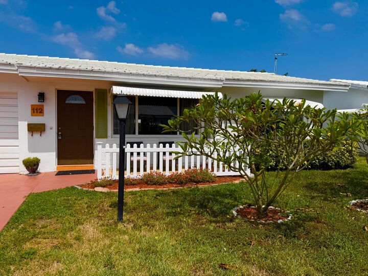 Property Photo:  112 SW 9th Street  FL 33426 