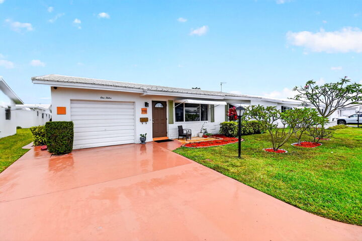 Property Photo:  112 SW 9th Street  FL 33426 