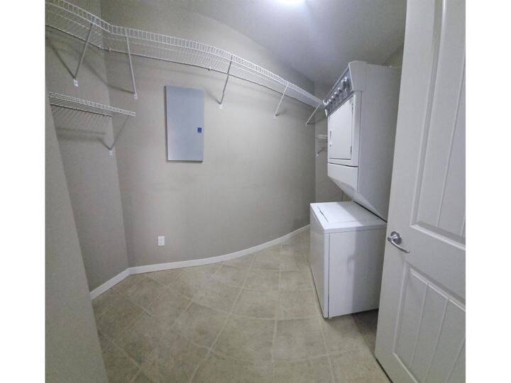 Property Photo:  32725 George Ferguson Way 210  BC V2T 5M5 