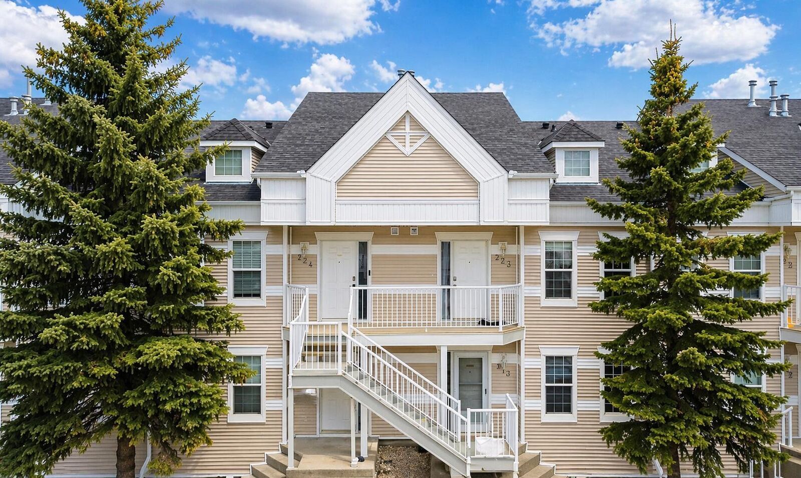 Property Photo: 103 Strathaven Drive E 323 AB T1P 1W3
