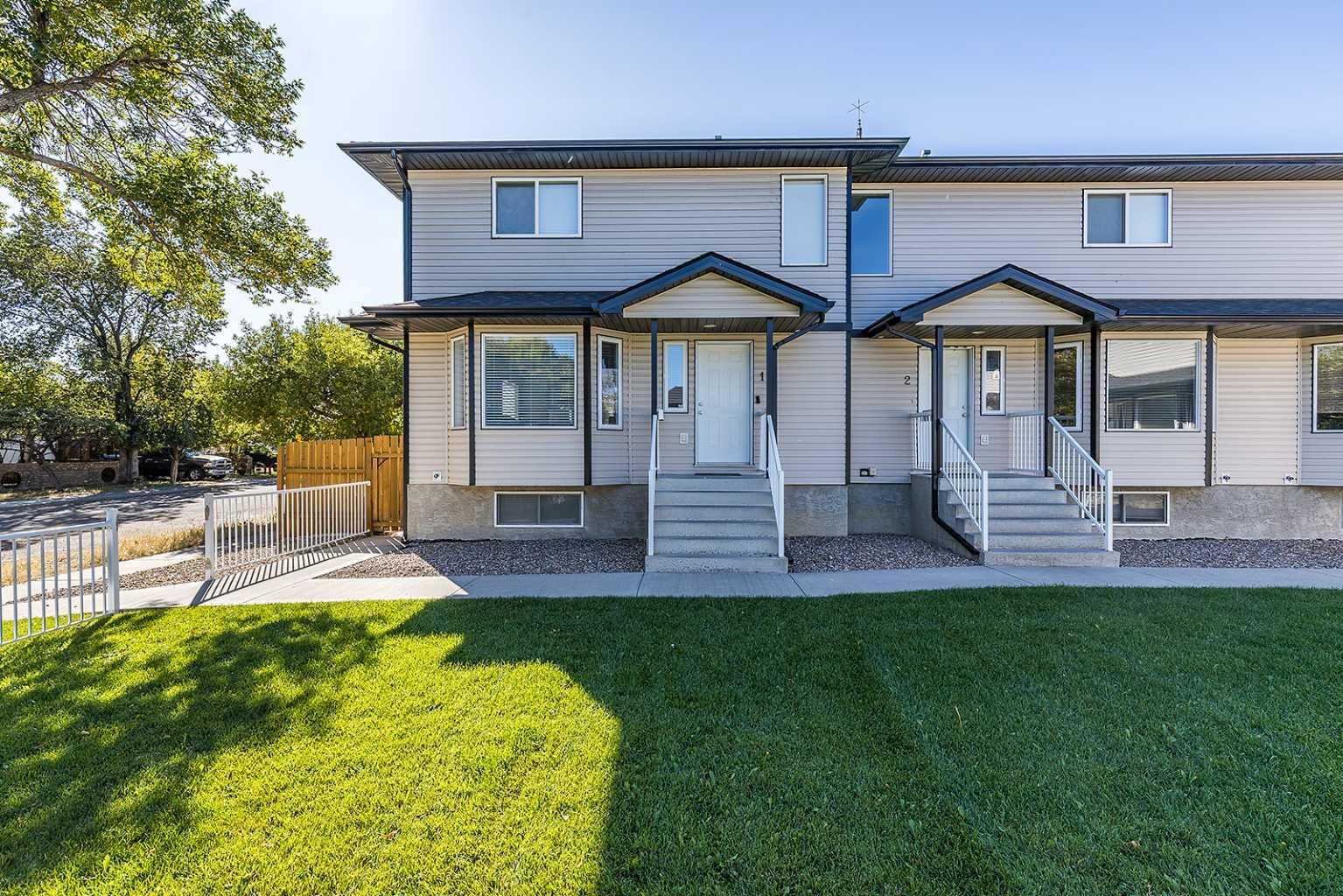 Property Photo:  115 3 Street NE 1  AB T0J 2P0 