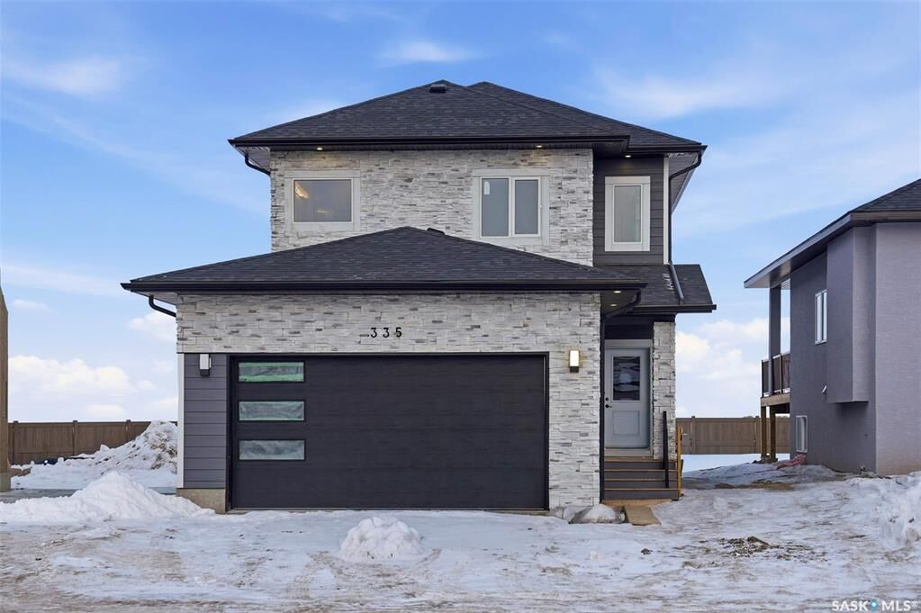 Property Photo: 335 Sharma Crescent SK S7W 1J1