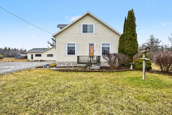 Property Photo:  1400 W M-55  MI 48763 