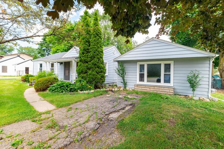 Property Photo:  8876 Sheldon Road  MI 48170 
