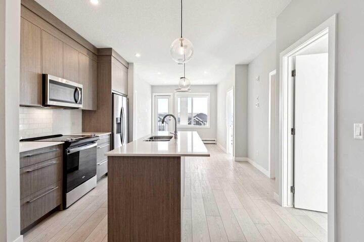 Property Photo: 111 Wolf Creek Drive SE 1305 AB T2X 5X2
