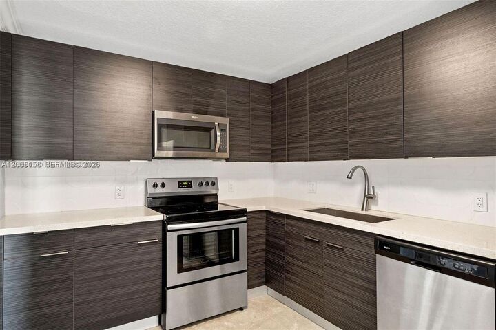 Property Photo:  390 Racquet Club Rd 202  FL 33326 