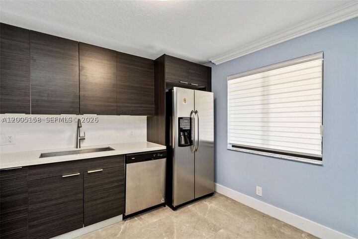 Property Photo:  390 Racquet Club Rd 202  FL 33326 