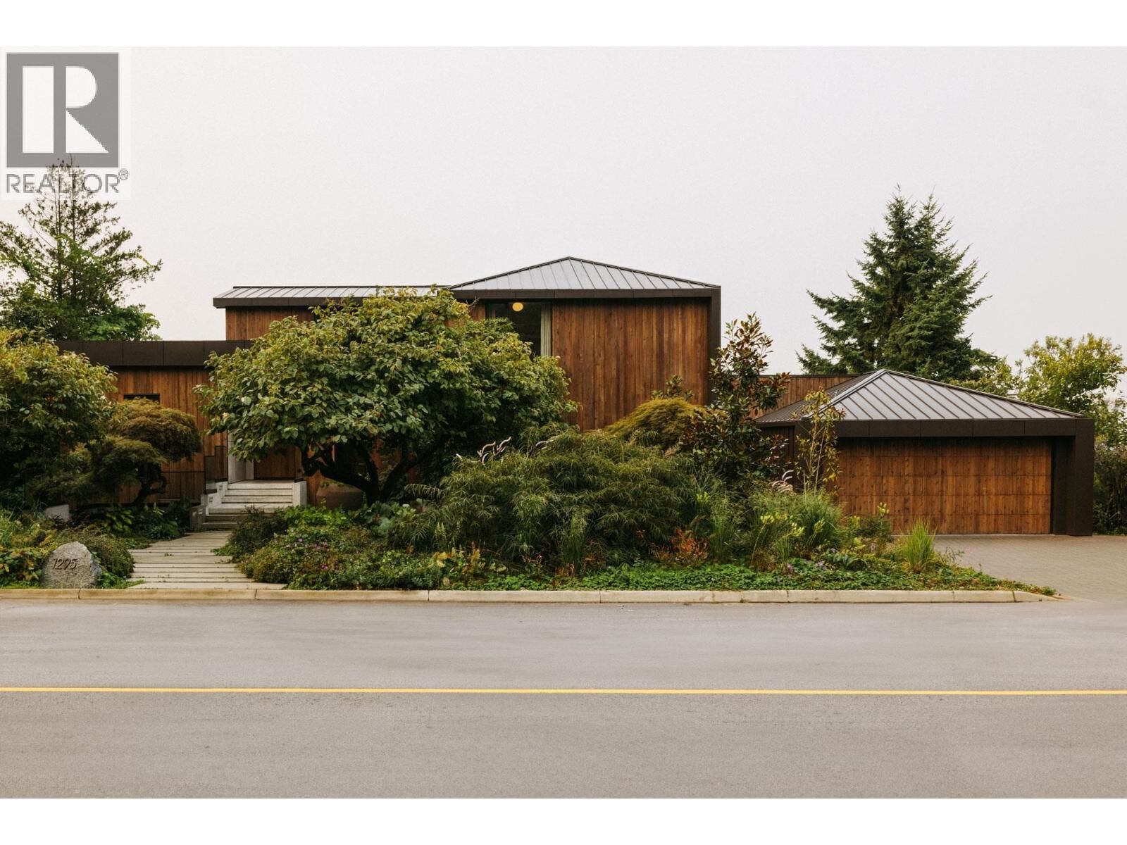Property Photo:  1295 West Keith Road  BC V7P 1Y9 