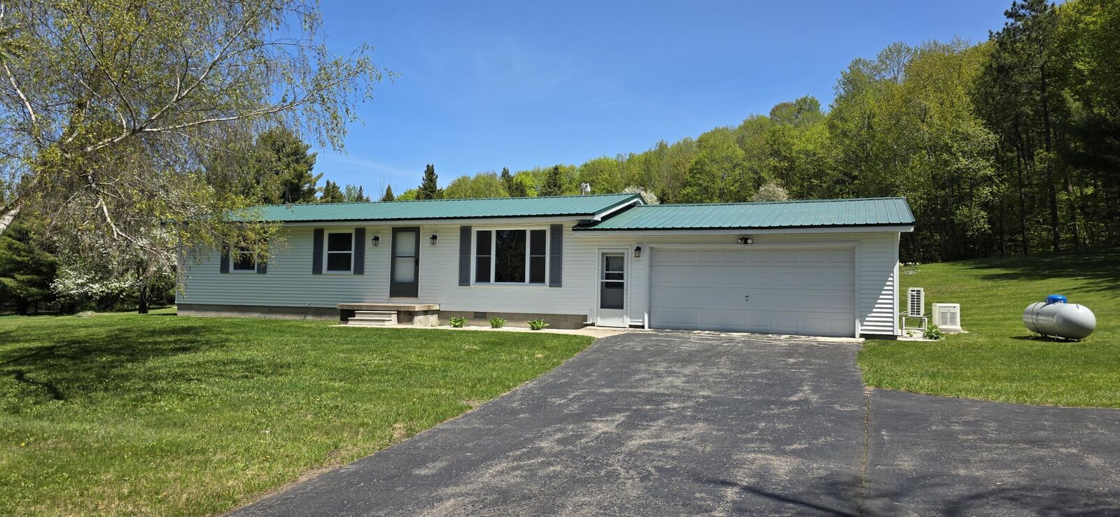 Property Photo:  5505 N 3 Mile Rd  MI 49745 