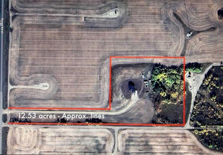 Property Photo: 451043 Rng Rd 65 AB T9W 1T3