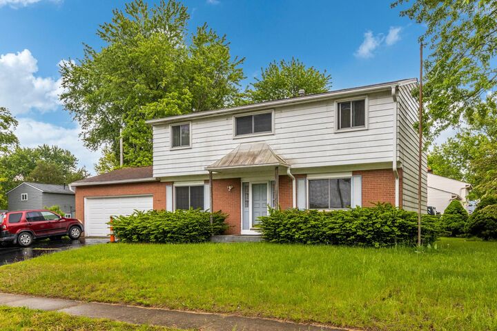 Property Photo:  5203 Quincy Drive  OH 43232 