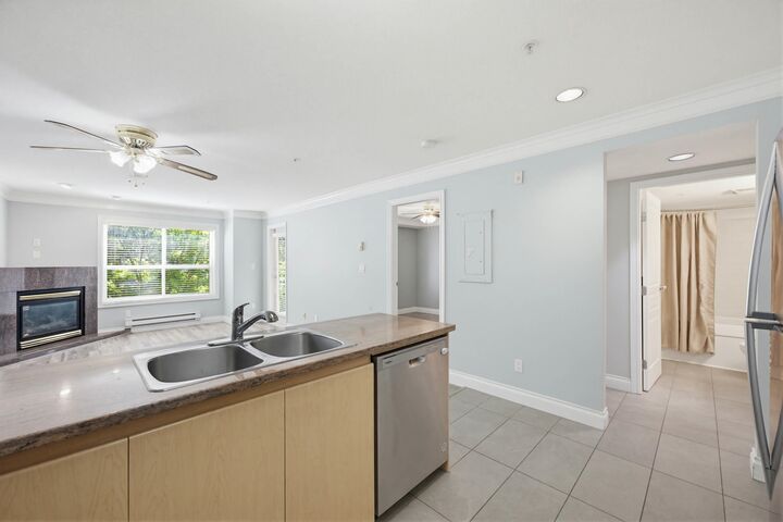 Property Photo: 8115 121A Street 202 BC V3W 1J2