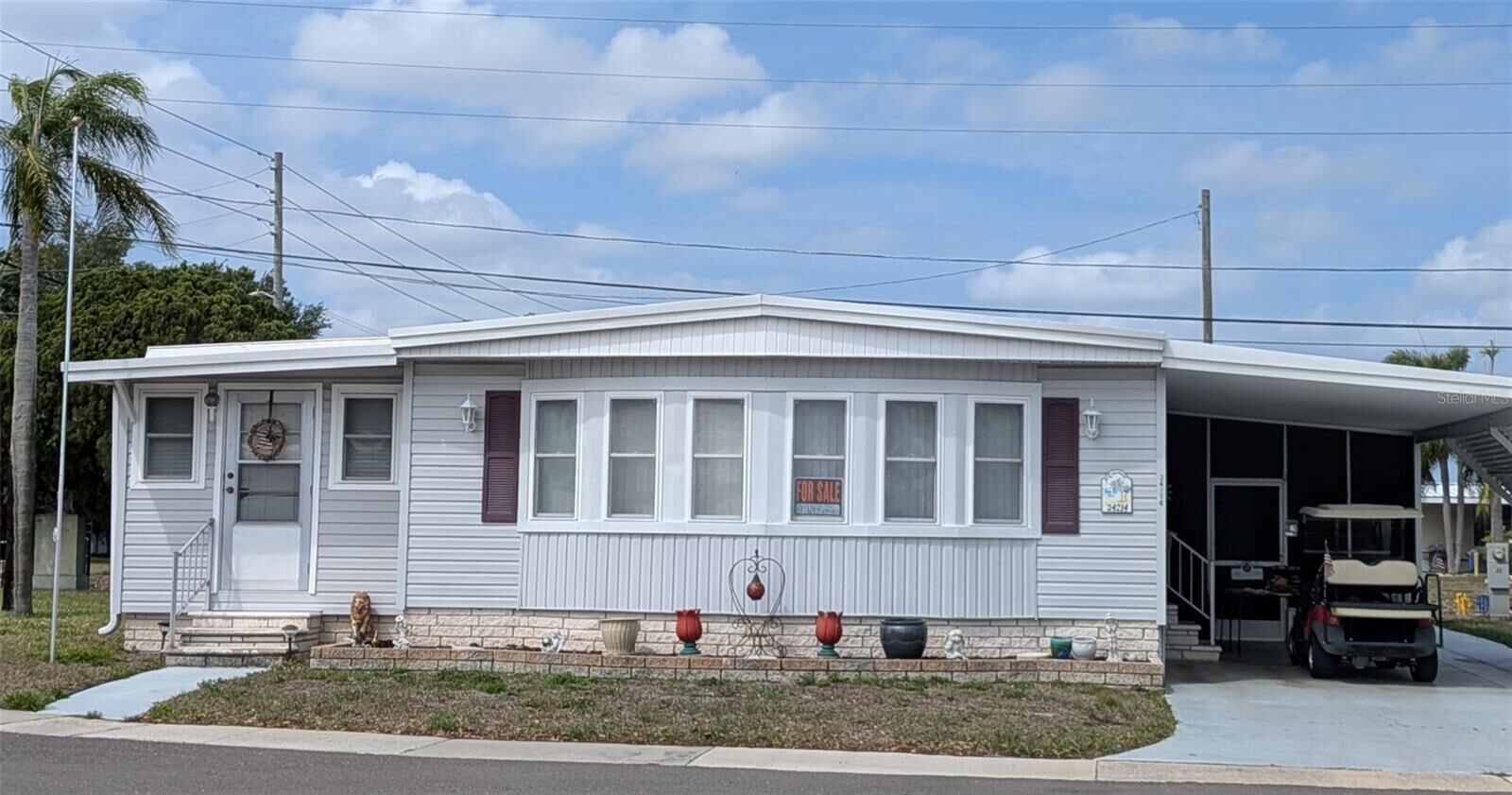 Property Photo:  34214 Canal Drive N  FL 33781 