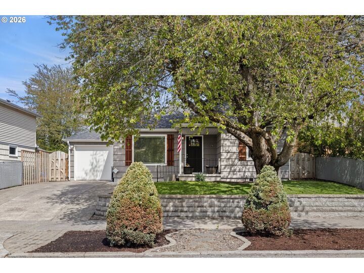 Property Photo:  9045 SE Alder St  OR 97216 