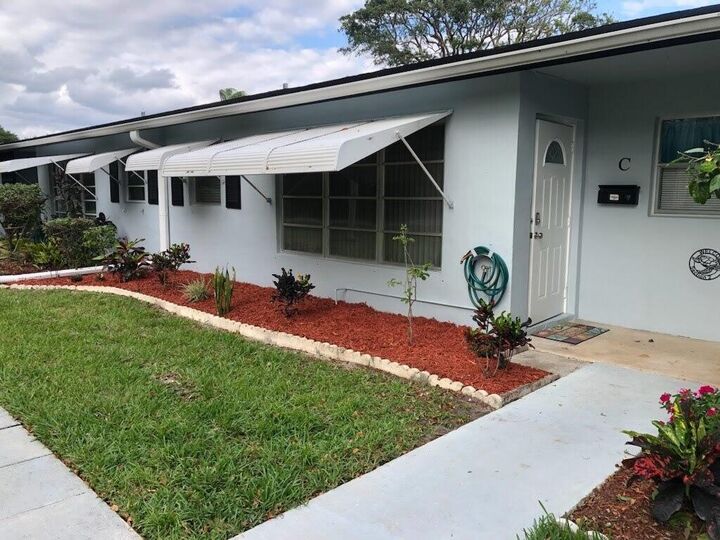Property Photo:  405 High Point Boulevard N C  FL 33445 
