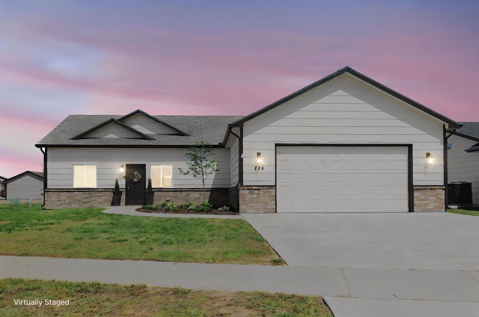 Property Photo: 724 N Redbud Ave KS 67147
