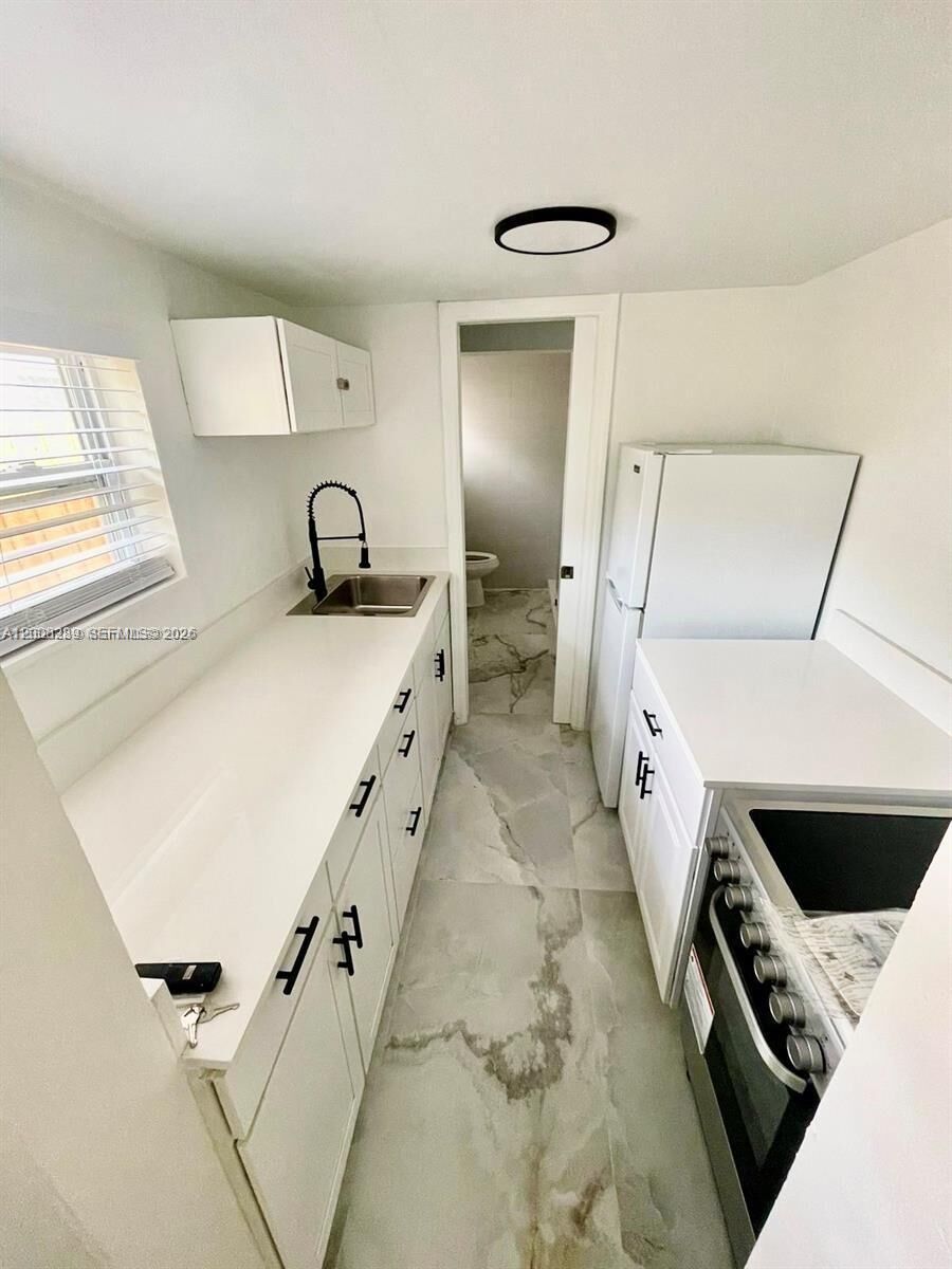 Property Photo:  1649 NE 8th Ave 1  FL 33305 