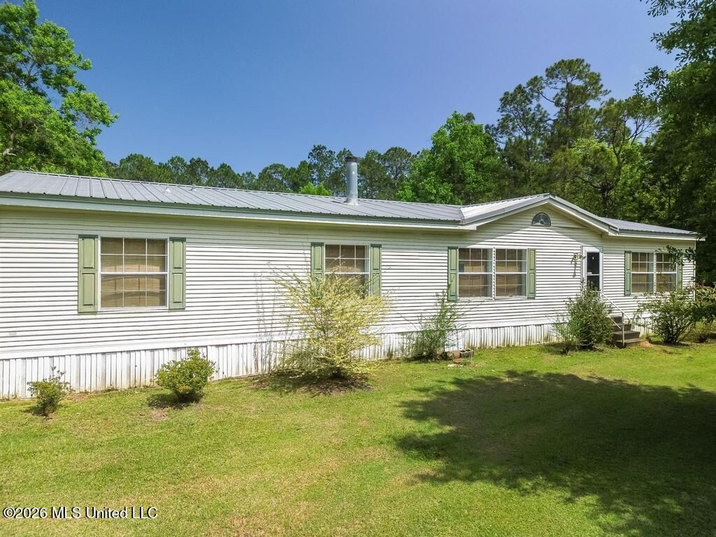 Property Photo:  17112 Camellia Street  MS 39556 