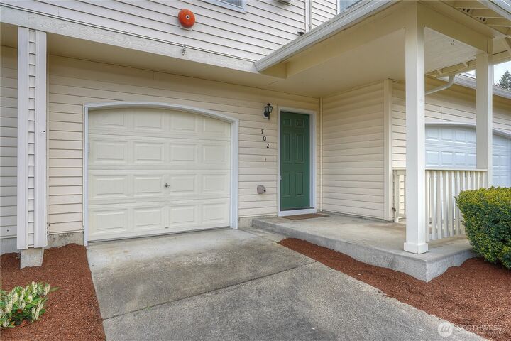 Property Photo:  4724  Mill Pond Drive SE 702  WA 98092 