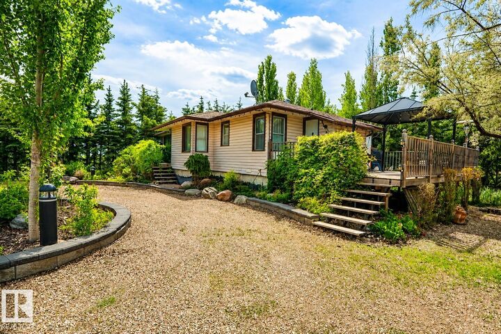 Property Photo: 400 60501 Range Road 120 AB T0A 0C0