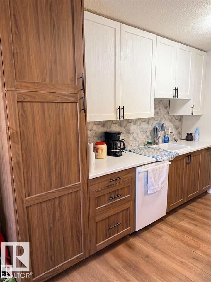 Property Photo:  10725 111 Street NW 106  AB T5H 3G2 