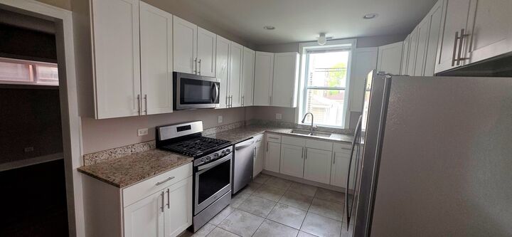 Property Photo: 5815 W Midway Parkway 1 IL 60644