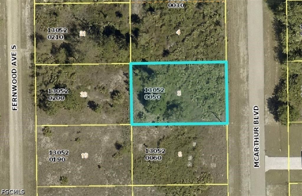 Property Photo:  414 McArthur Boulevard  FL 33974 