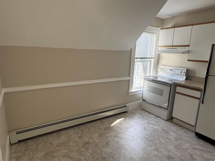Property Photo:  704 Belmont Street  NH 03104 