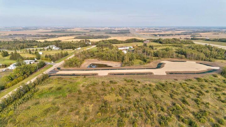 Property Photo: 701413 Range Road 72 10 AB T8W 5J6