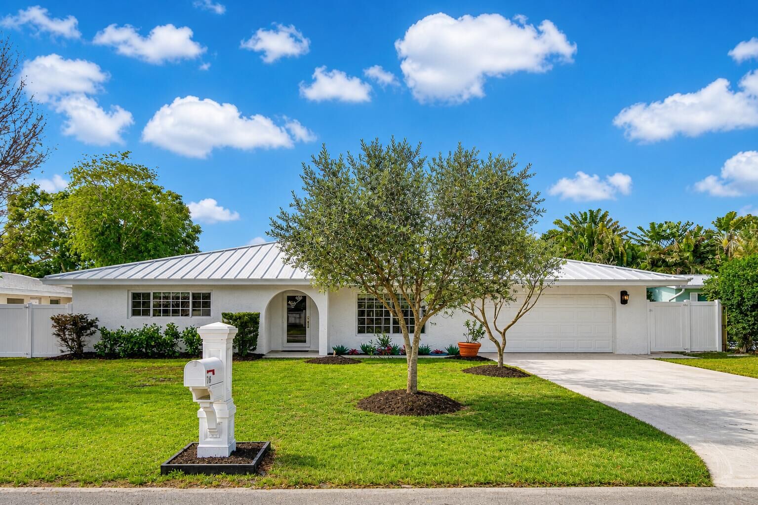 Property Photo:  718 SW 27th Place  FL 33435 