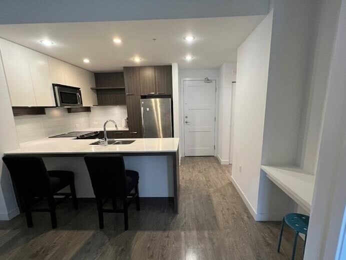 Property Photo: 608 Como Lake 320 BC V3J 0B2