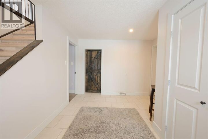 Property Photo:  113 Dundas Road  AB T9K 1B8 