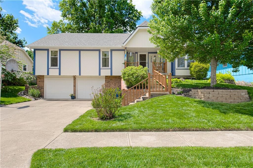 Property Photo:  1306 Downing Street  MO 64068 