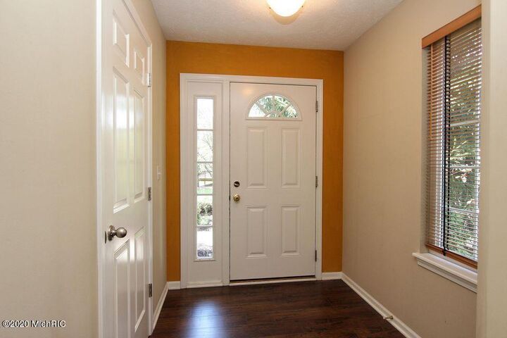 Property Photo:  5890 E Lyn Haven Drive SE  MI 49512 