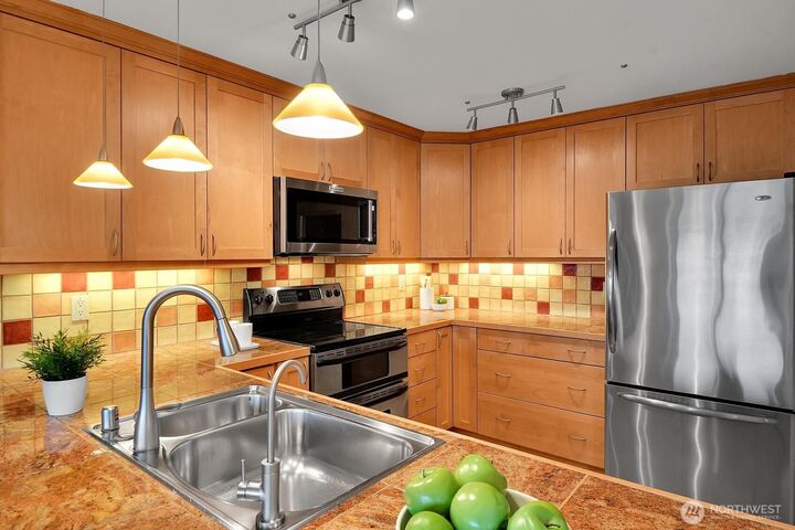 Property Photo:  1964  26th Avenue W 203  WA 98199 