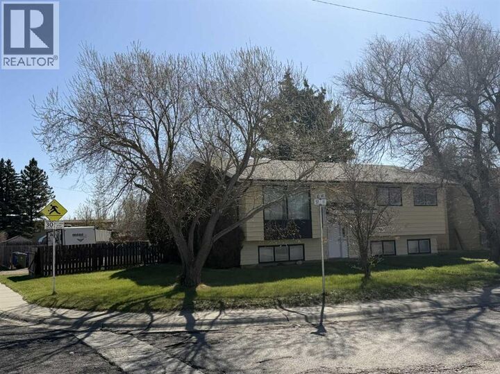 Property Photo:  3917 52 Street  AB T1G 1B7 