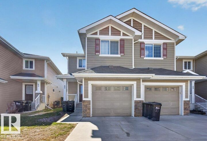 Property Photo:  219 Charlotte Way 85  AB T8H 0T3 