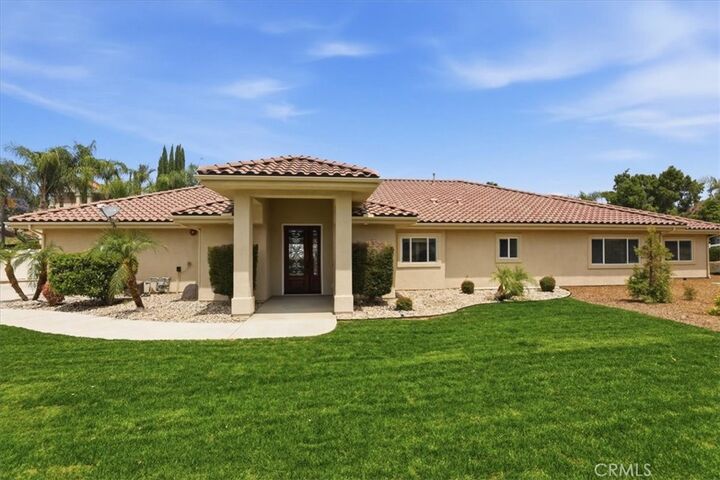 Property Photo:  14202 Meadowlands  CA 92503 