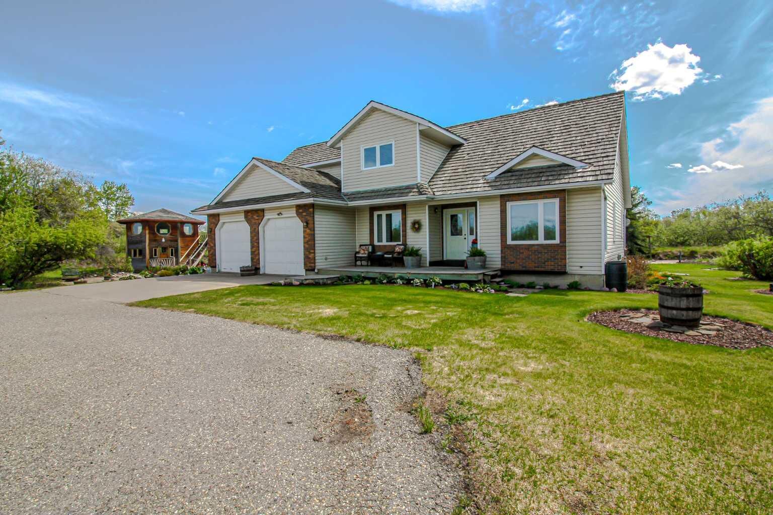 Property Photo: 720047 Range Road 63 AB T8X 4K1