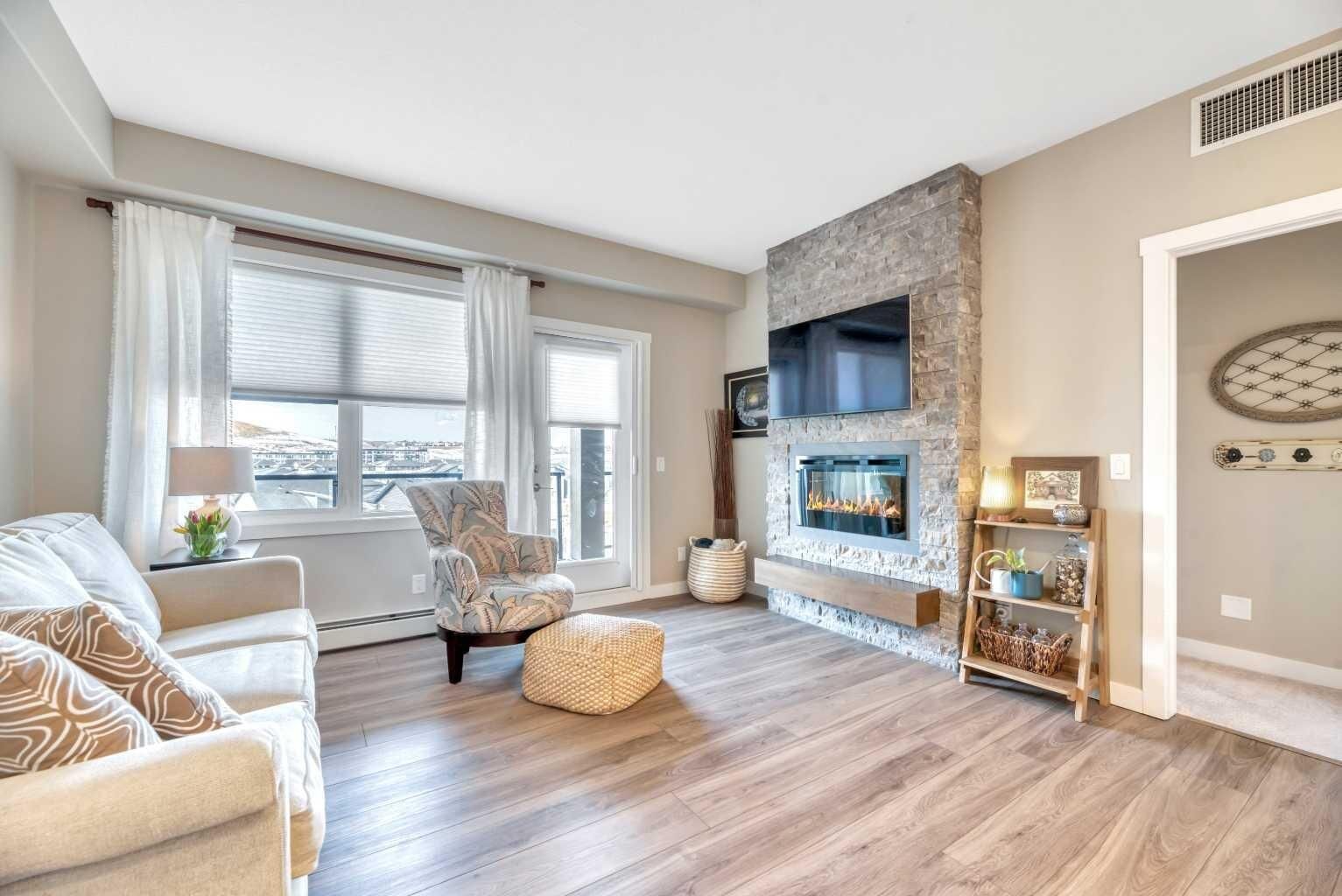 Property Photo:  55 Wolf Hollow Crescent SE 415  AB T2X 5K9 