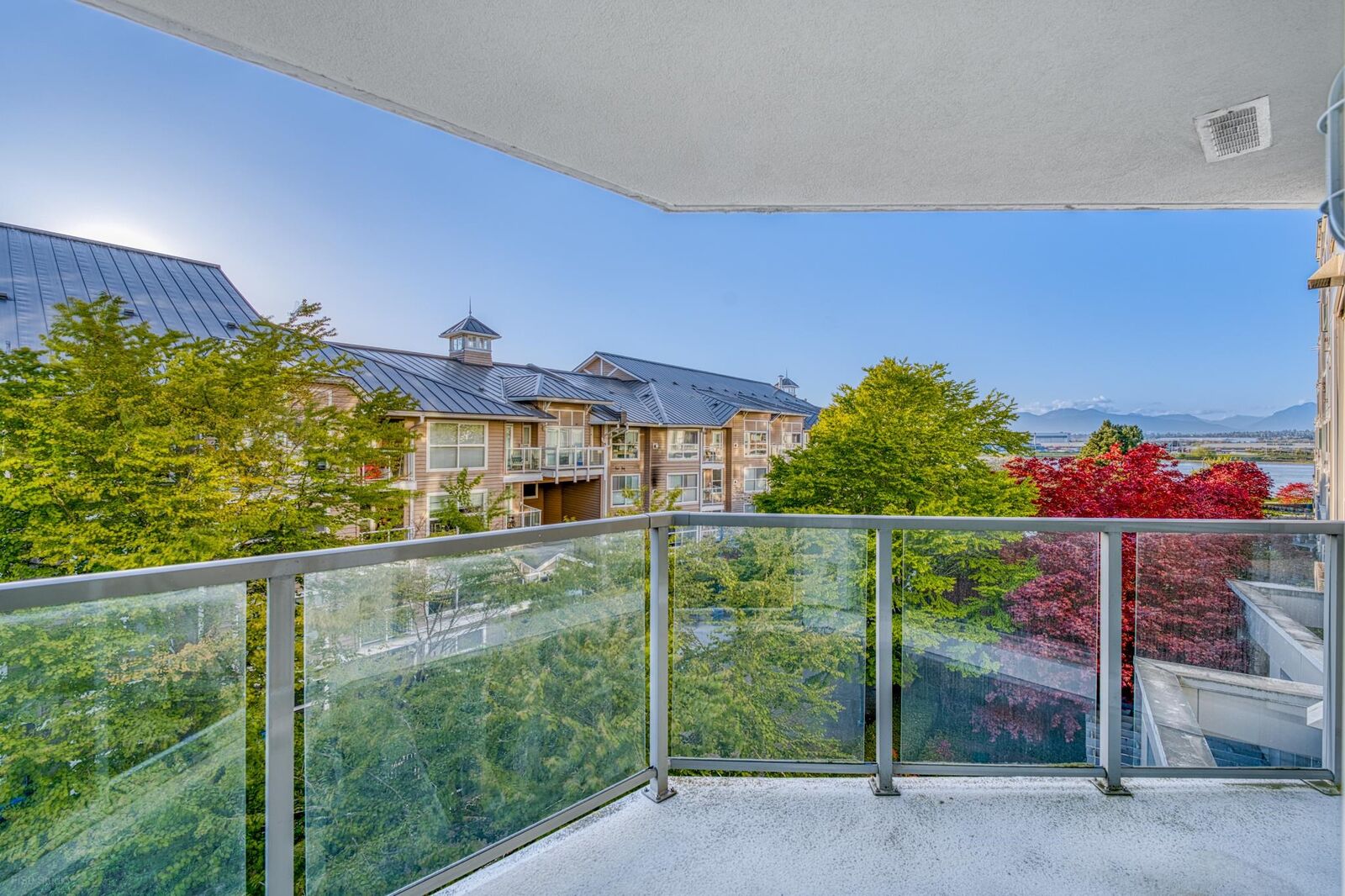 Property Photo:  5860 Dover Crescent 401  BC V7C 5S6 