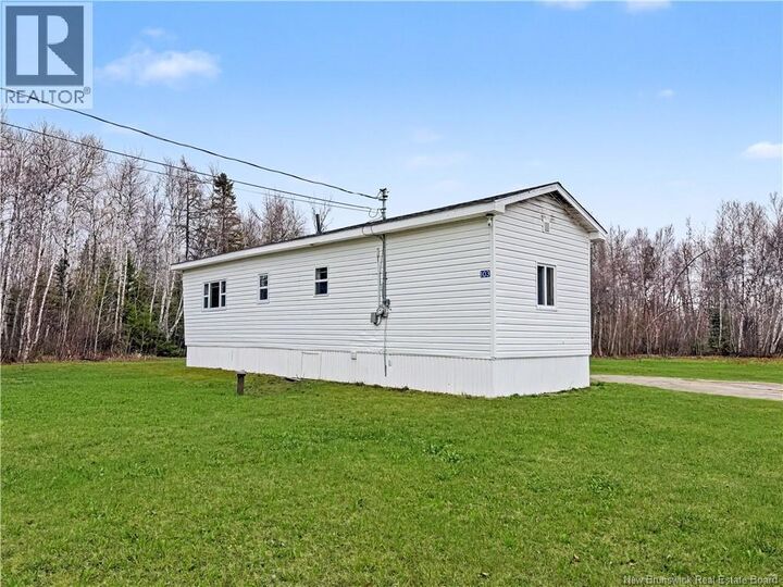 Property Photo:  103 Saint Paul  NB E4Y 1V9 